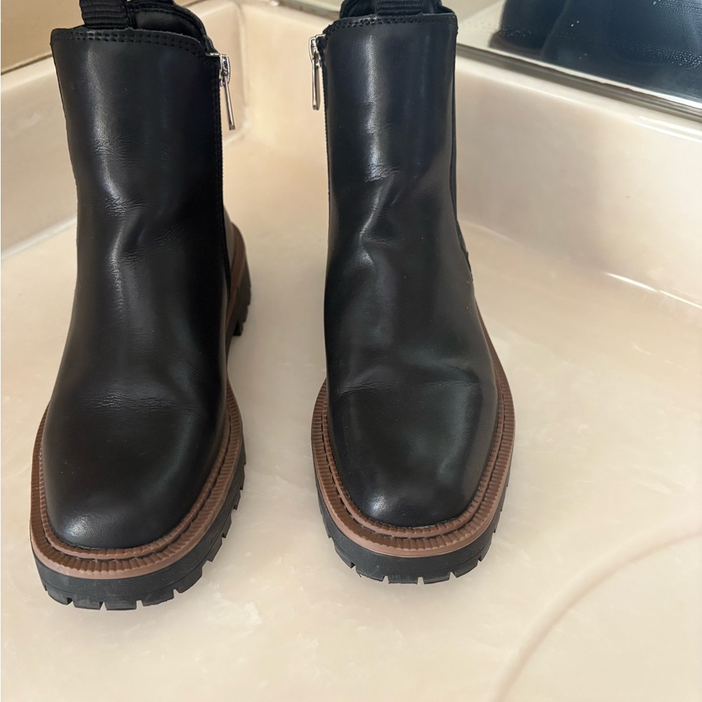 Elegant Black Ankle Boots with Brown Sole
